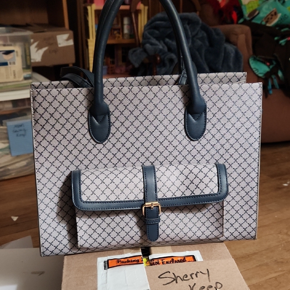 Elegant Blue and Cream Satchel with Structured Design